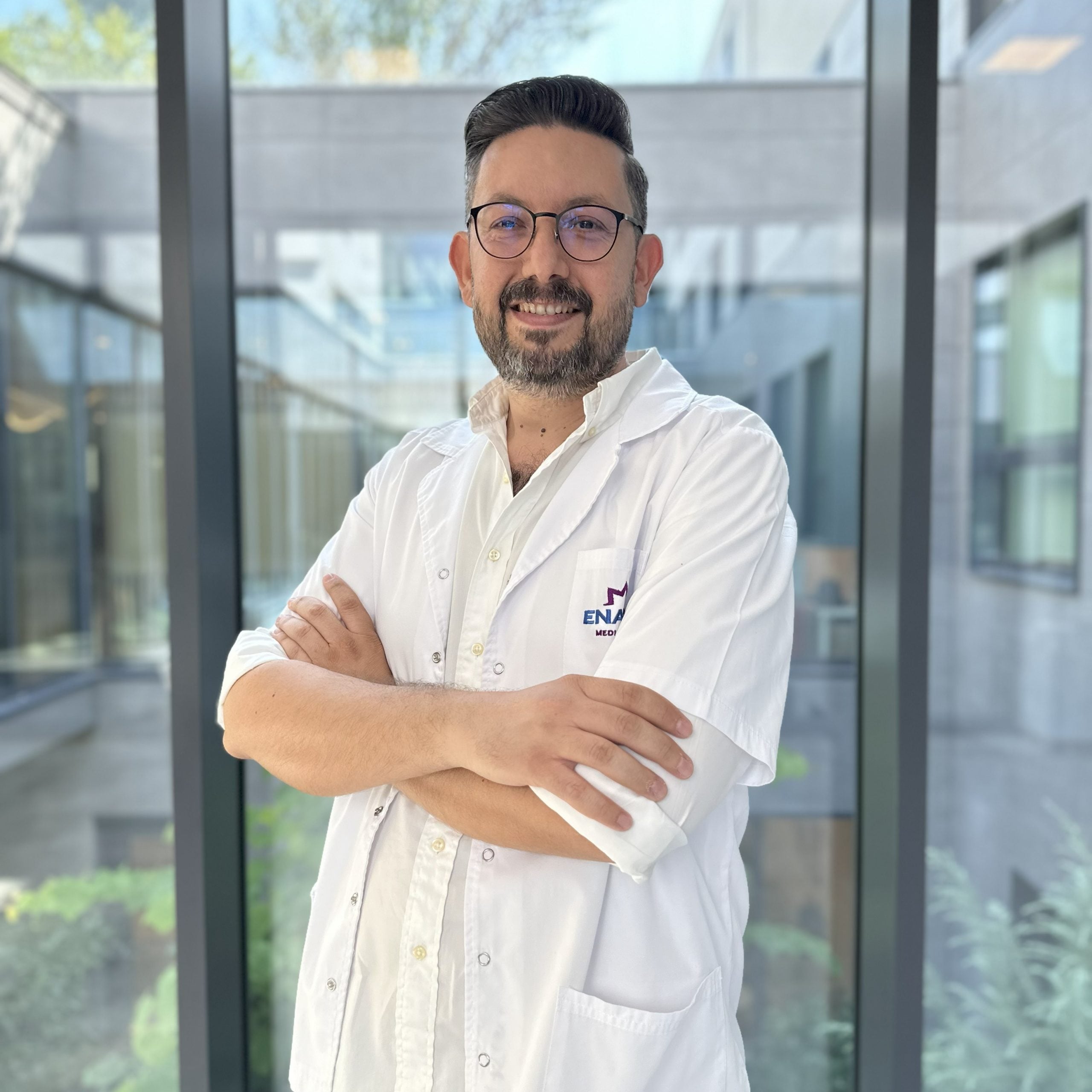 Dr. Alizzi Khalid