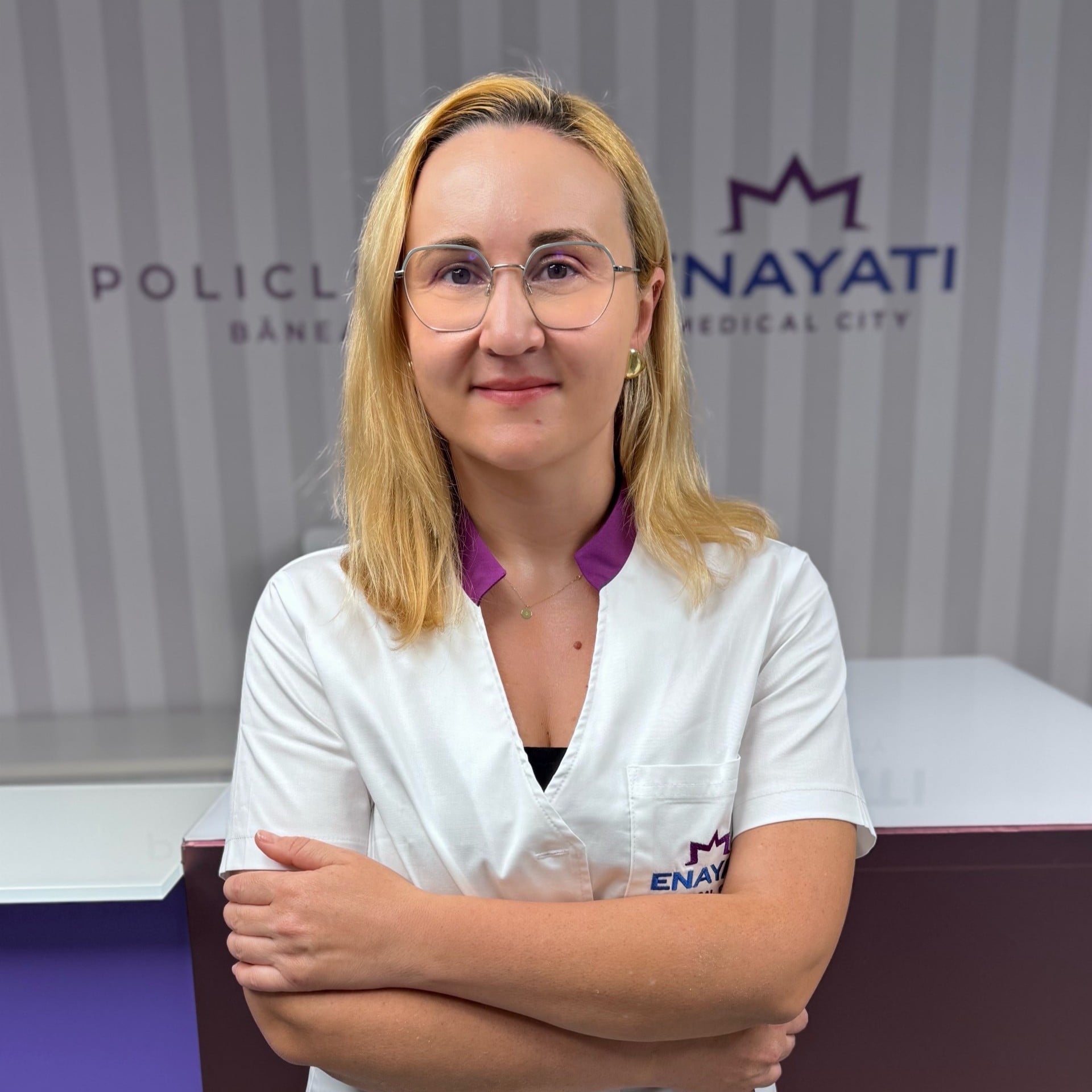 Dr. Raluca Borină